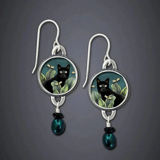 Boucles d'oreilles pendantes vintage avec chat noir tropical